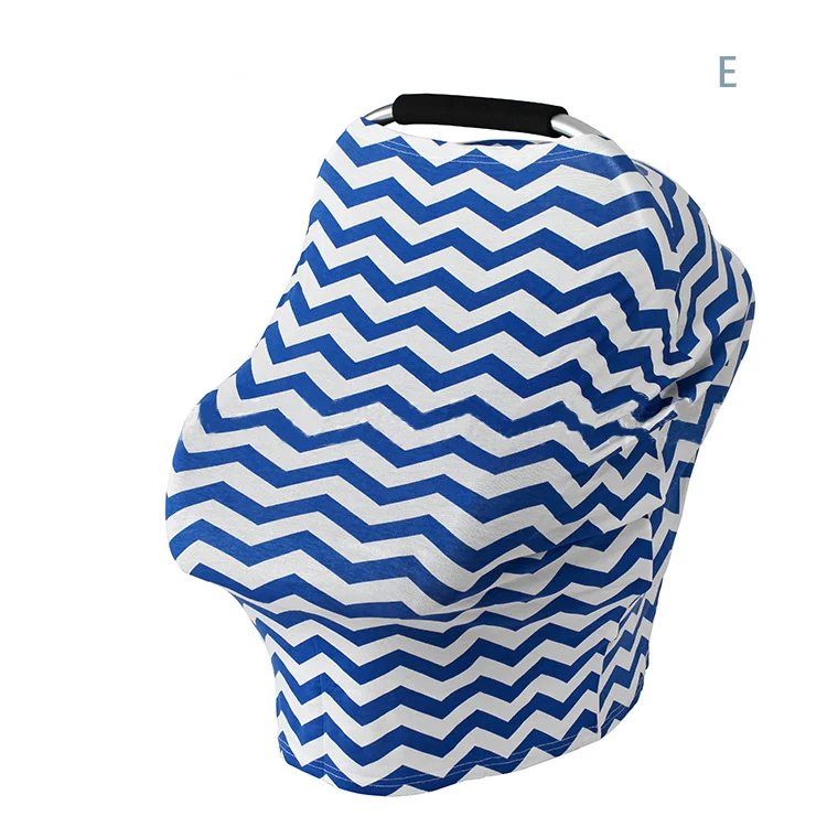 Nursing cover scarf used as a car seat canopy, protecting baby from sun