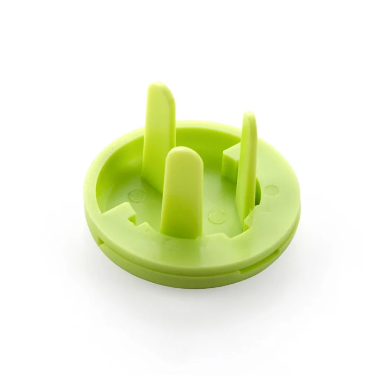 Close-up of the twist mechanism on a plastic socket cover protector