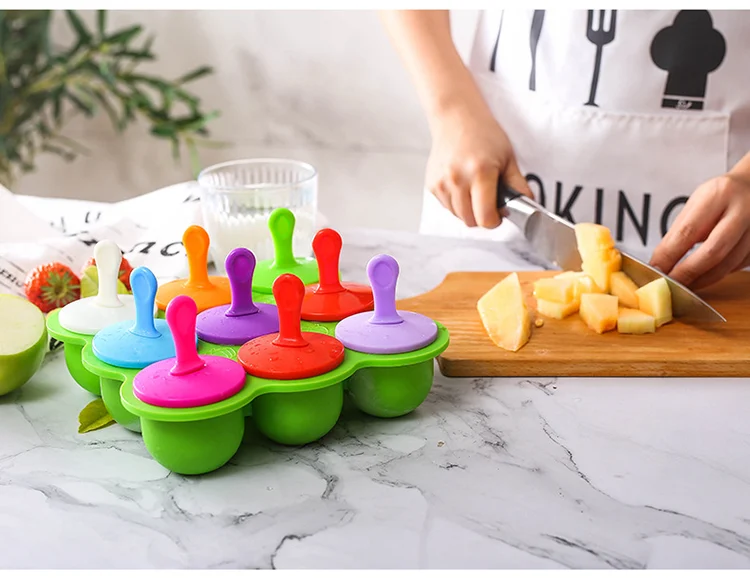 Silicone mold with lid and cubes in a microwave