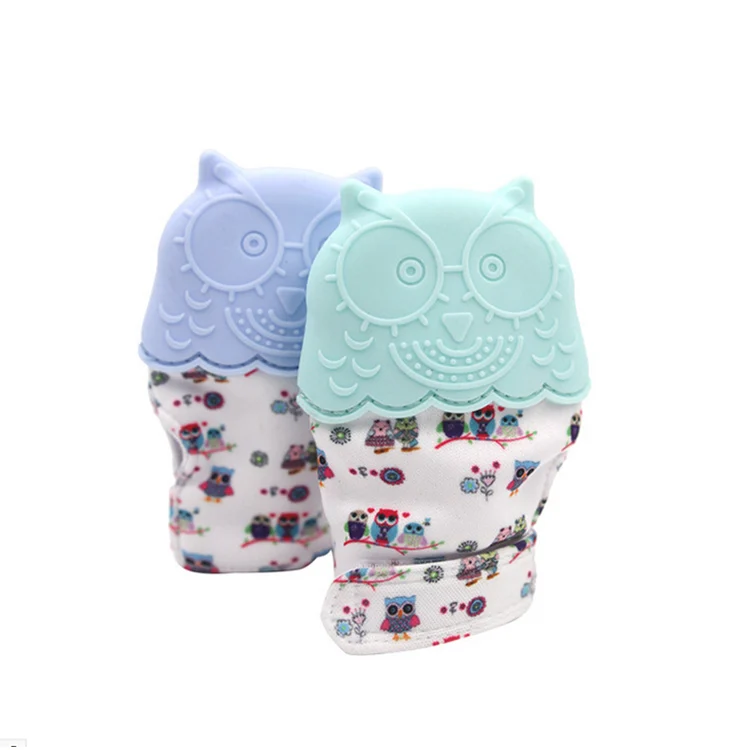Blue silicone teething glove with sound film, side view showing the anti-shedding hook