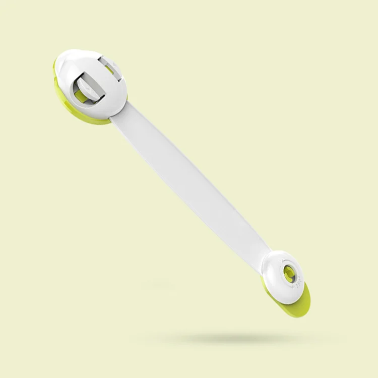Black 360-degree baby safety lock mounted on a cabinet door