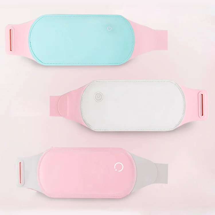 Pink 3 gear heat belt worn around the waist with USB cable connected