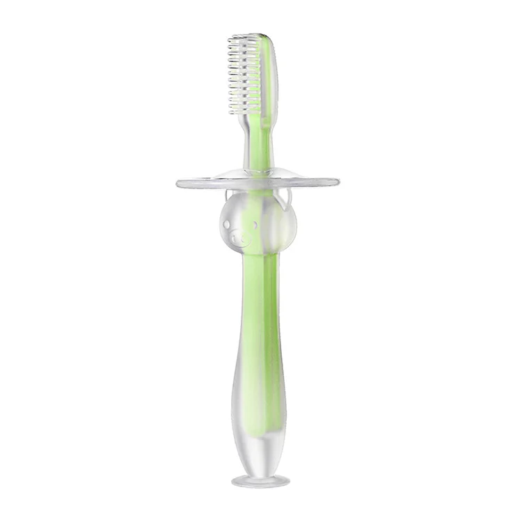 Blue baby toothbrush with pig handle and brush head close-up