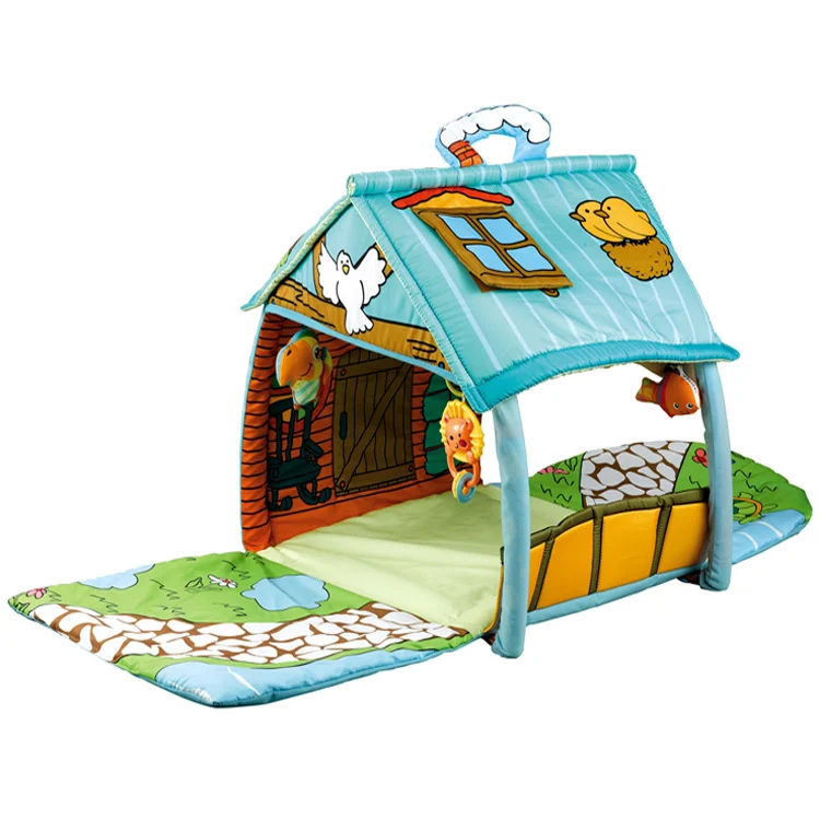 Multicoloured baby gym house play mat with hanging toys, standing upright