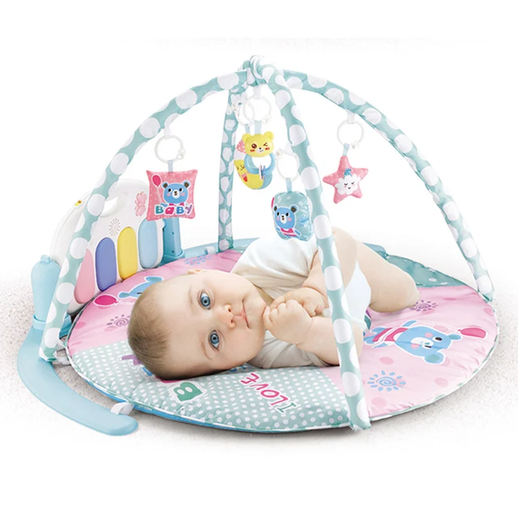 Folded baby play mat stored in a gift box, showing compact size