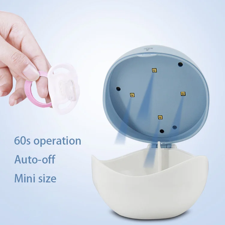 Sterilizer box with 4 AA batteries inserted, ready for portable use