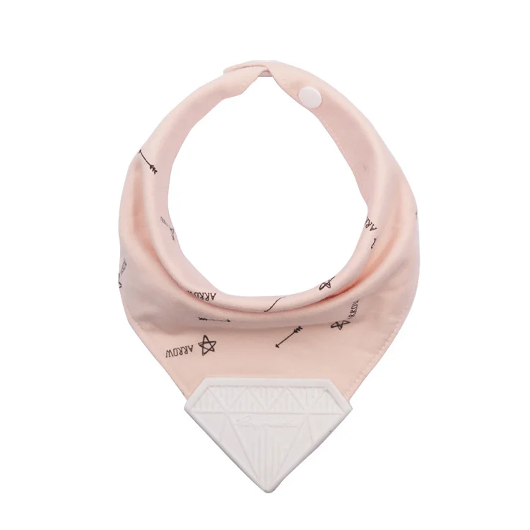 Pink cotton and silicone bandana bib with diamond-shaped teether, worn as a bib
