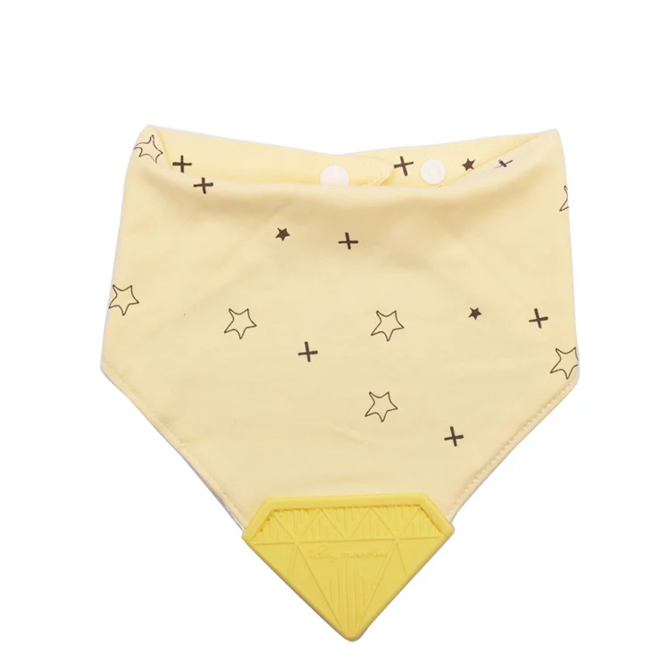 Close-up of the diamond-shaped silicone teether on the bib corner
