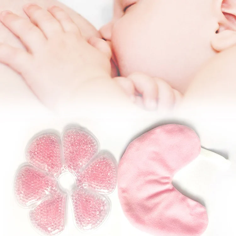 Set of two breast gel pads with fabric covers and pouch, laid out on a surface