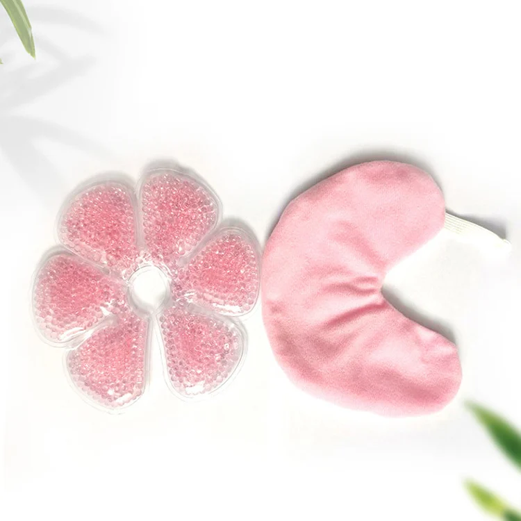 Two reusable breast gel pads in fabric covers, placed side by side