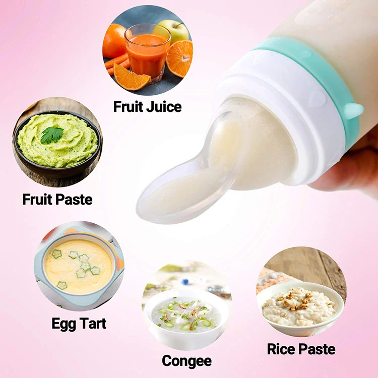 Feeding spoon placed on a baby's hand with a piece of fruit in the mesh bag