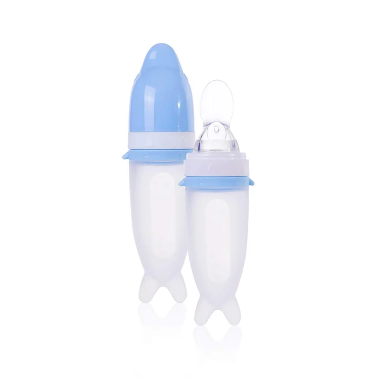 Pink 50ml silicone feeding spoon with hygienic cover and mesh bag attached