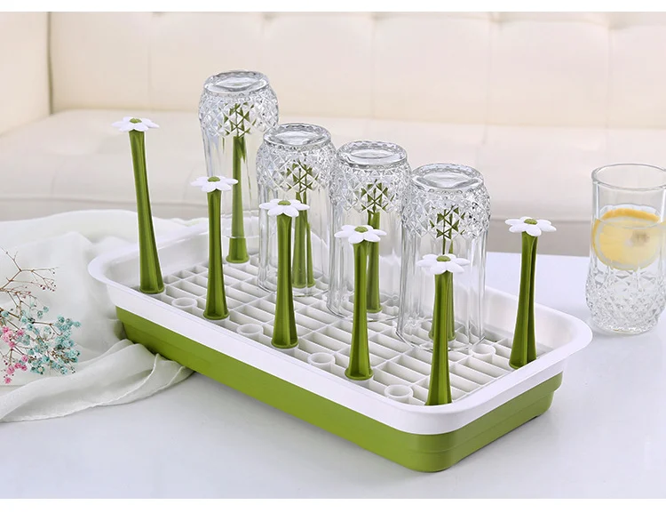 Baby bottle drying rack in a small kitchen space, showing compact design