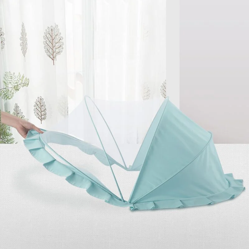 Purple mosquito net canopy with transparent net, showing the baby's head inside