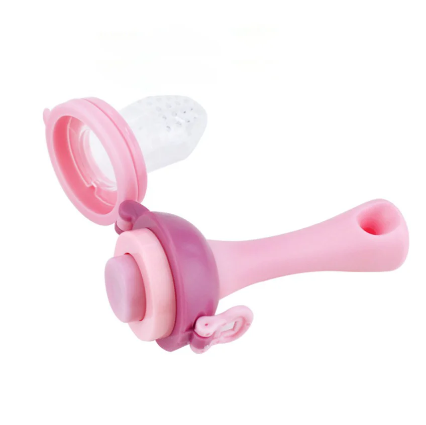 Feeder in use by a baby, holding it with one hand
