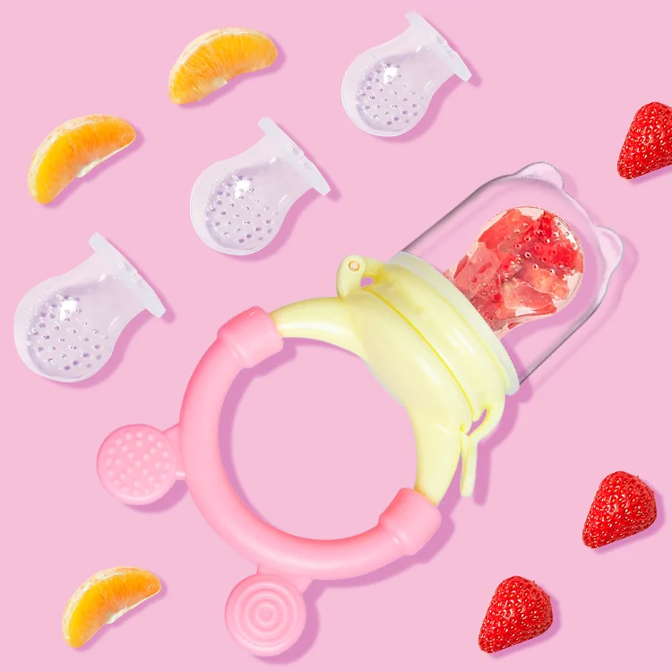 Green silicone teether food feeder with cover closed and standing upright