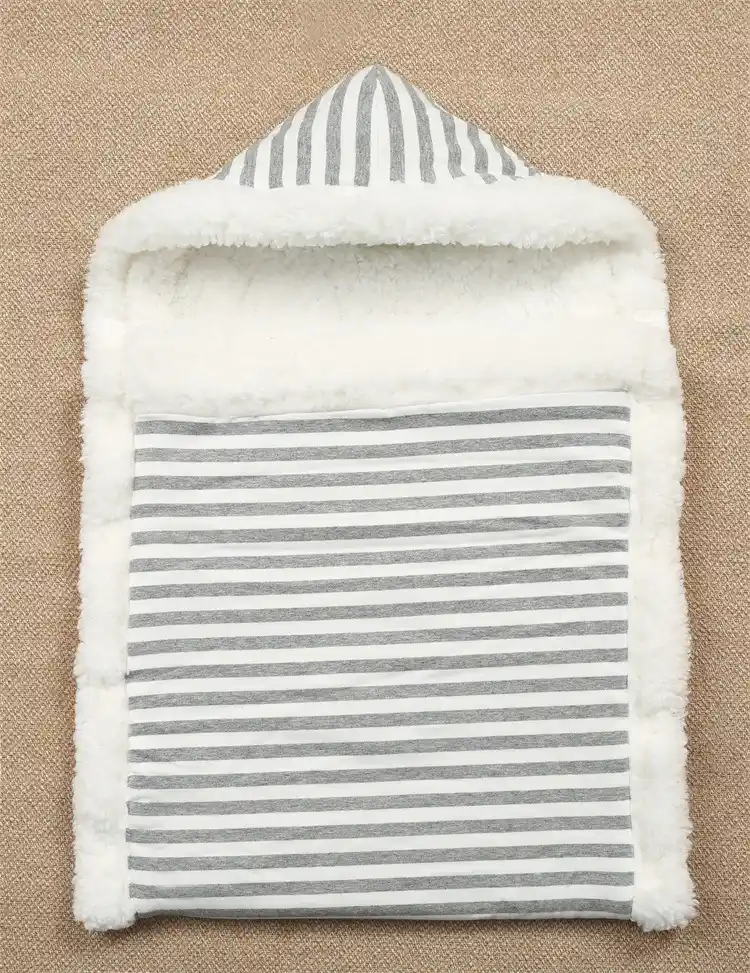 Close-up of snap button and fabric texture on the sleeping bag