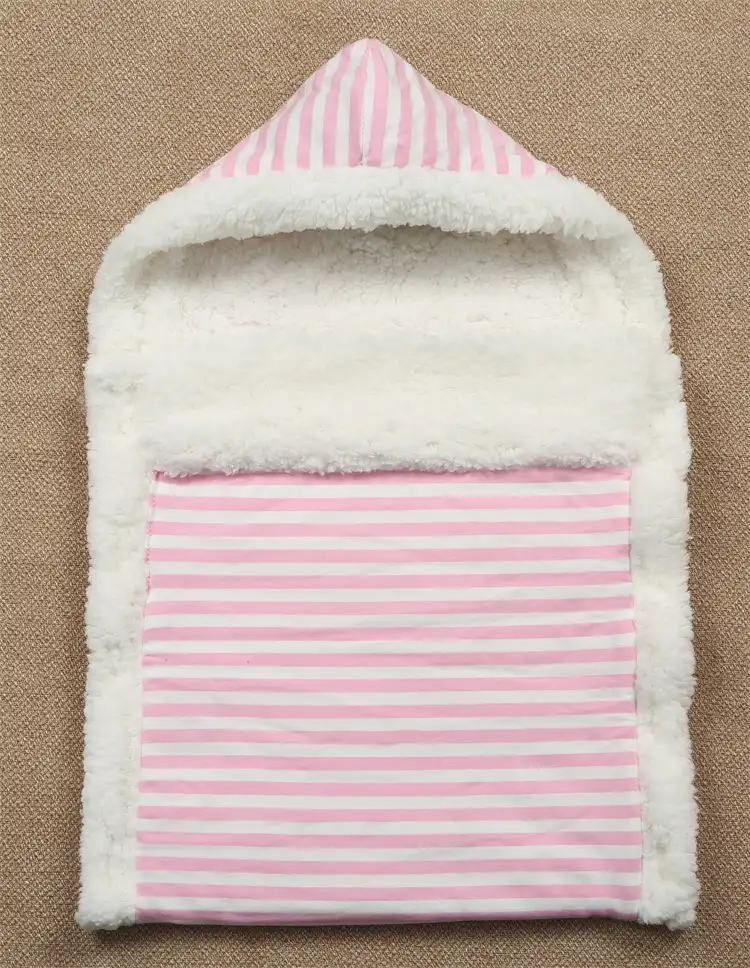 Grey stroller wrap sleeping bag folded with snap buttons visible