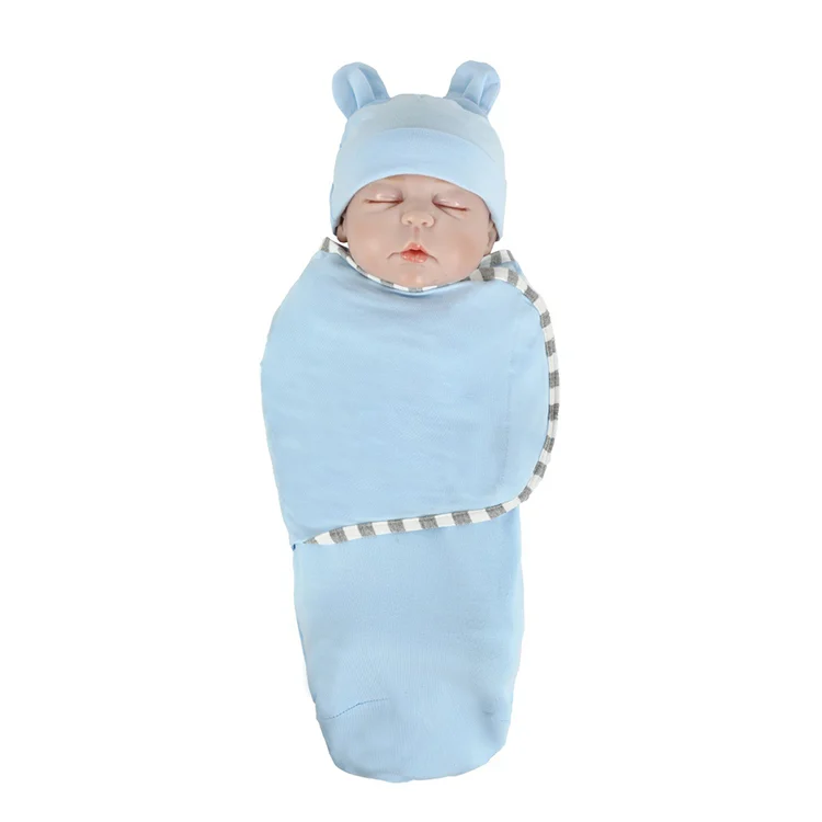 Black cotton stretchy baby swaddle blanket with hat, showing the full wrap design