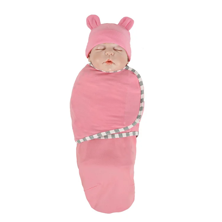 Yellow cotton stretchy baby swaddle blanket with hat, close-up of the hat seam