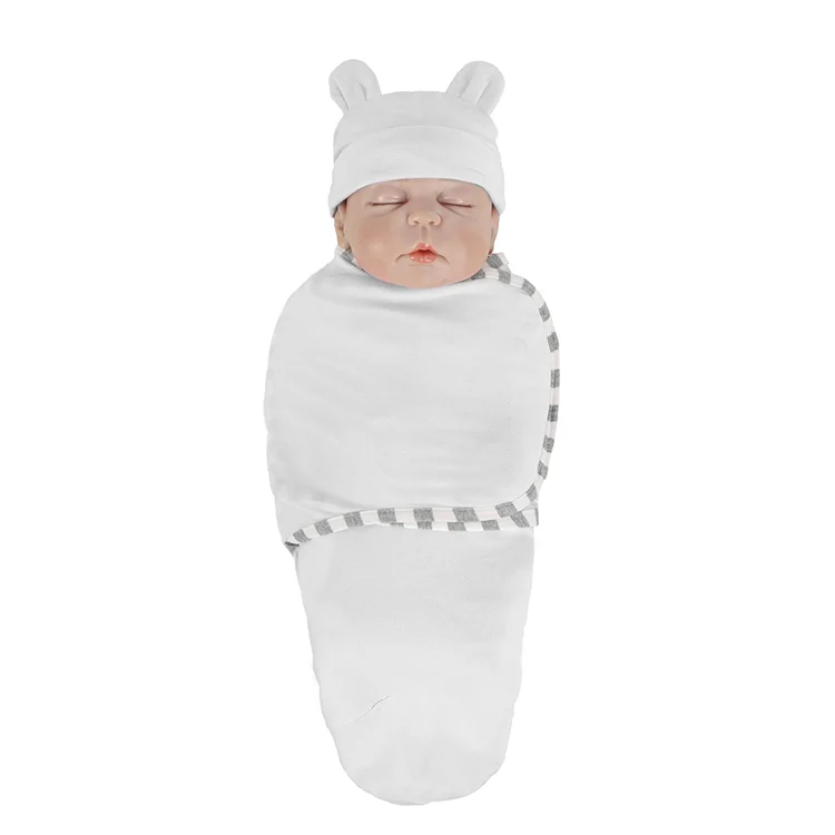 White cotton stretchy baby swaddle blanket with hat, side view showing the stretch