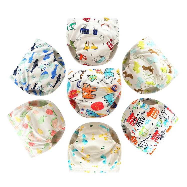 Diaper laid out with all layers visible: outer, middle, inner
