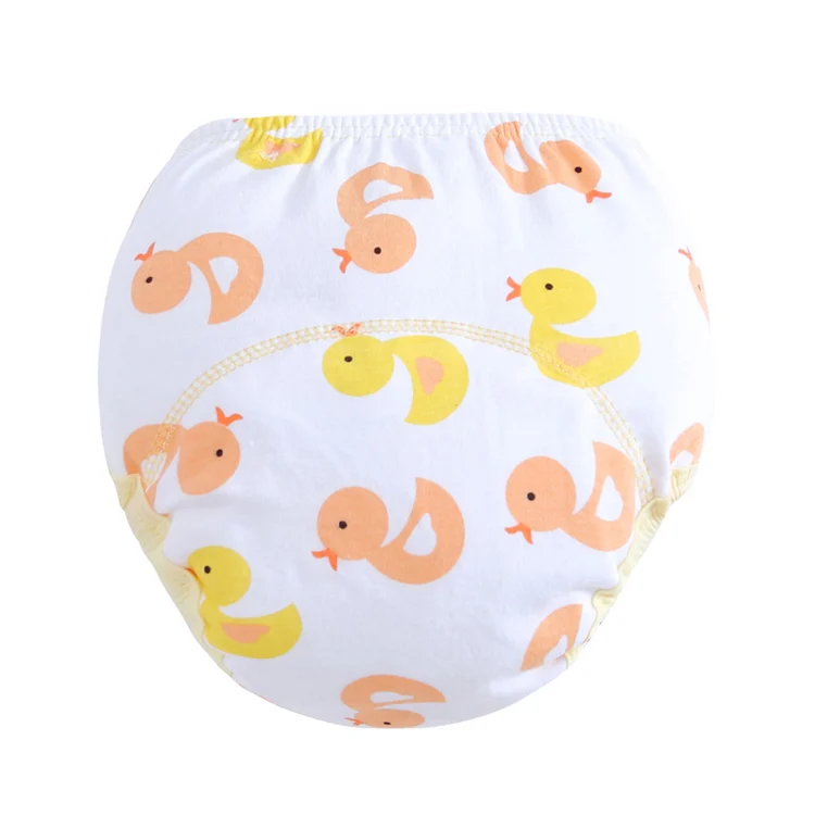 Reusable cloth diaper worn on a baby dummy, showing fit and comfort