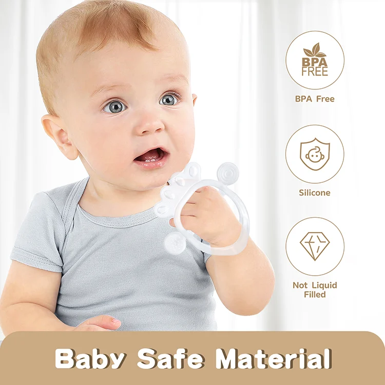 Baby teether set being held by a small hand, demonstrating grip size