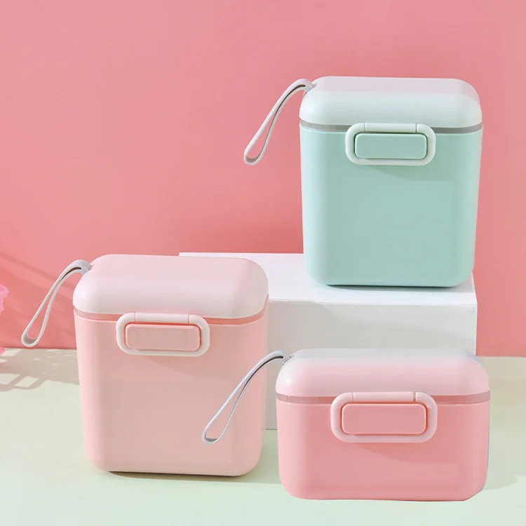 White 400ml baby food dispenser with lid closed, standing upright