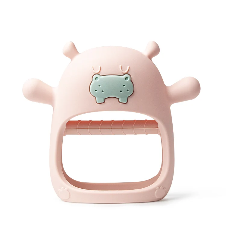 Green hippo teether with nipples on both sides, showing side view