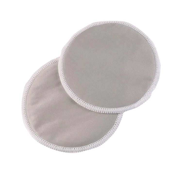 Stack of nursing pads in different colours, shown in a retail pack