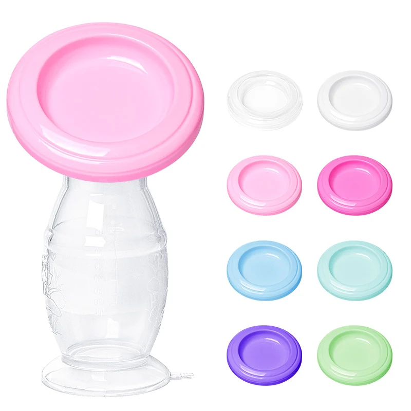 Grey 90ml manual breast pump standing upright with lid off