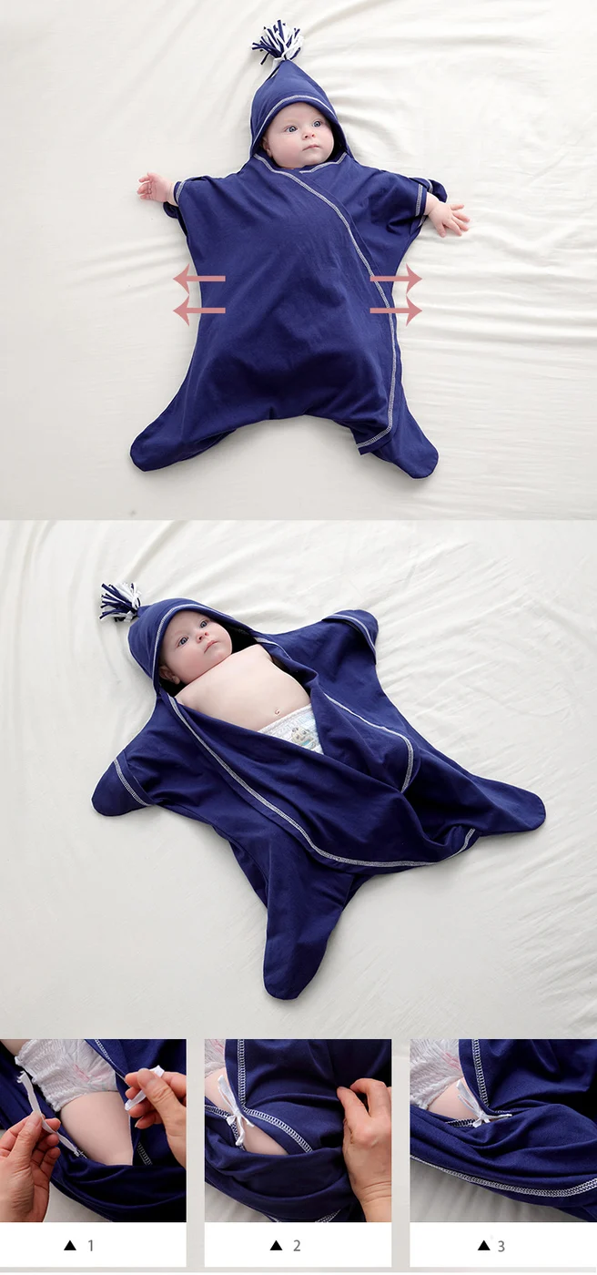 White baby sleep bag with the lace-up tied, showing the full starfish design