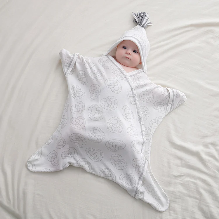 Blue star-shaped baby sleep bag with lace-up strings tied, showing the full size