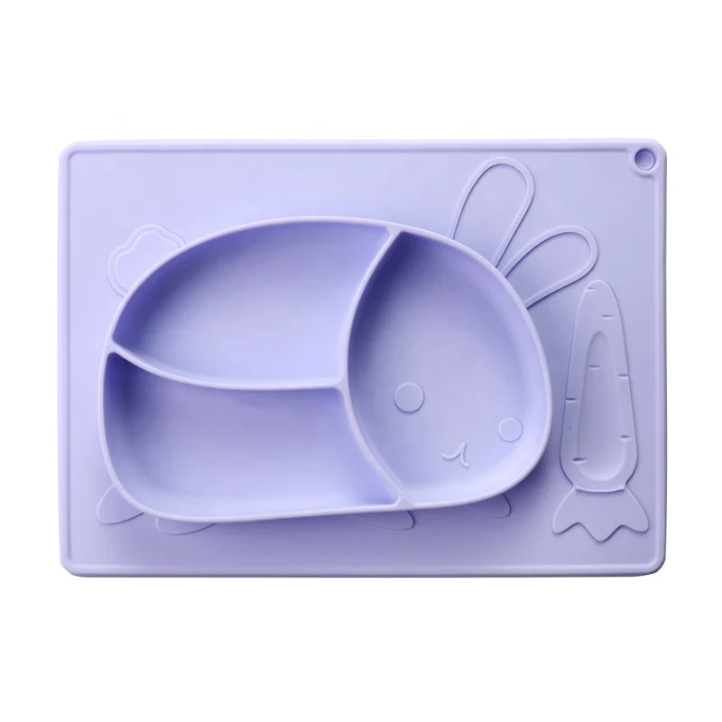 Blue baby plate with tiger design and suction base on a high chair