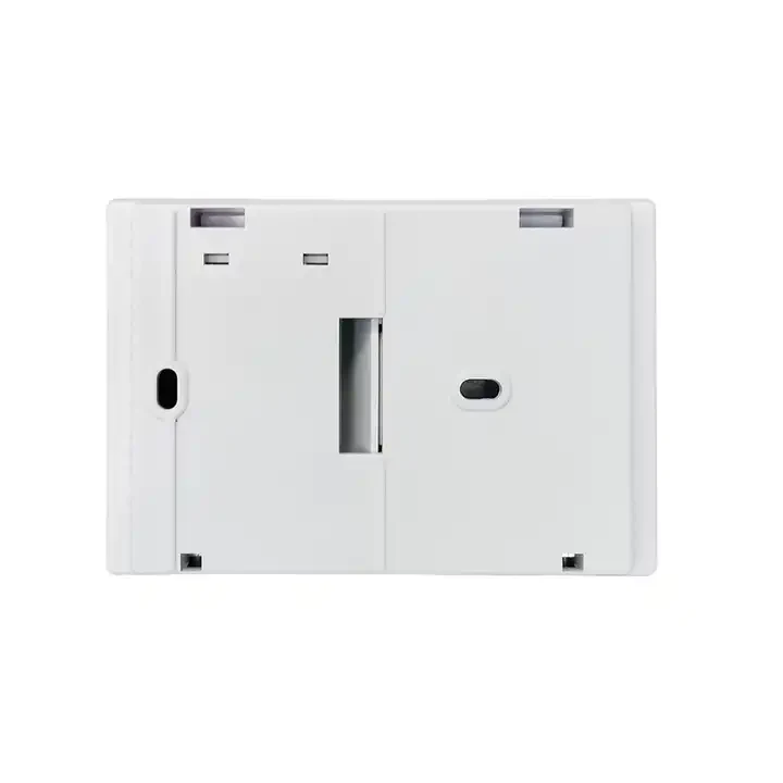 Model C3 indoor heating and cooling thermostat with push buttons and clock display, view 7