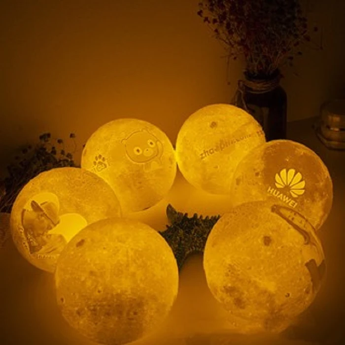 Customised 3D printed moon night light with touch dimming, view 2
