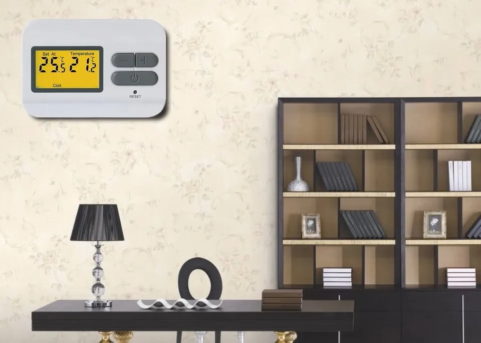 S2301 wired room thermostat installed above a console table