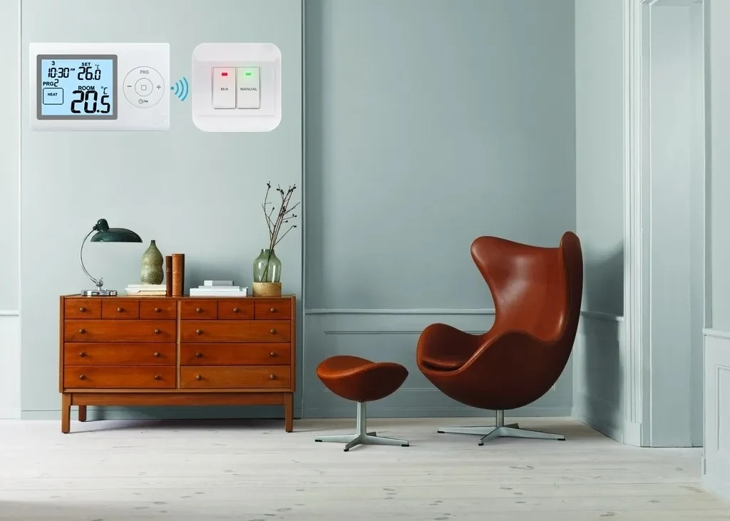 ST2402RF wireless thermostat and receiver installed in a living room