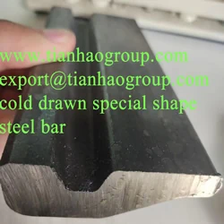 Custom engineered steel profile held in hand
