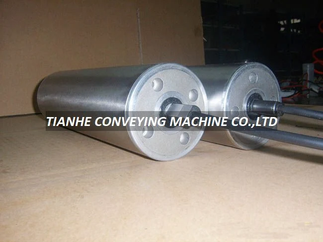 130 mm diameter AC motorized roller with knurled surface, galvanized finish, mounted on a conveyor frame