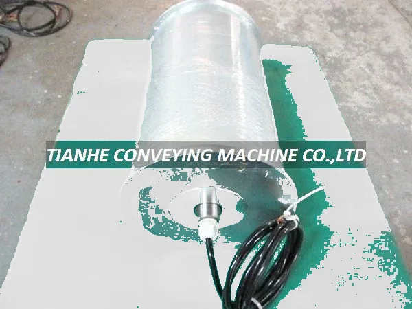 Alloy steel bevel gear motorized roller with guide, 113 mm diameter, galvanized finish, 500 mm tube face, mounted on a conveyor frame