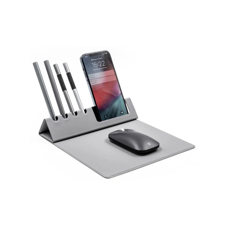 Desk mat in use with mouse and notebook