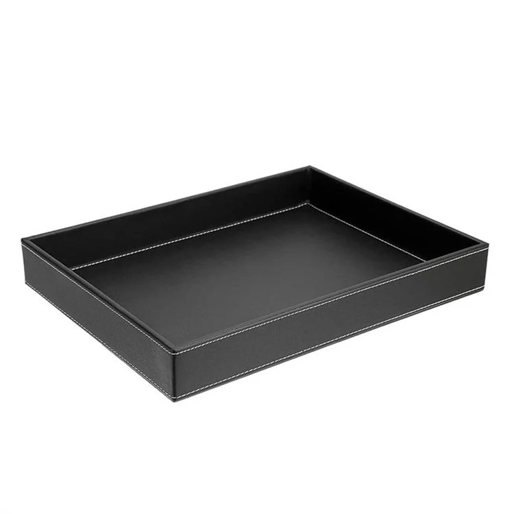 Black leather tray shown from above