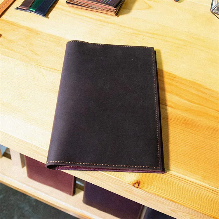 Built-in pen loop detail on the leather cover