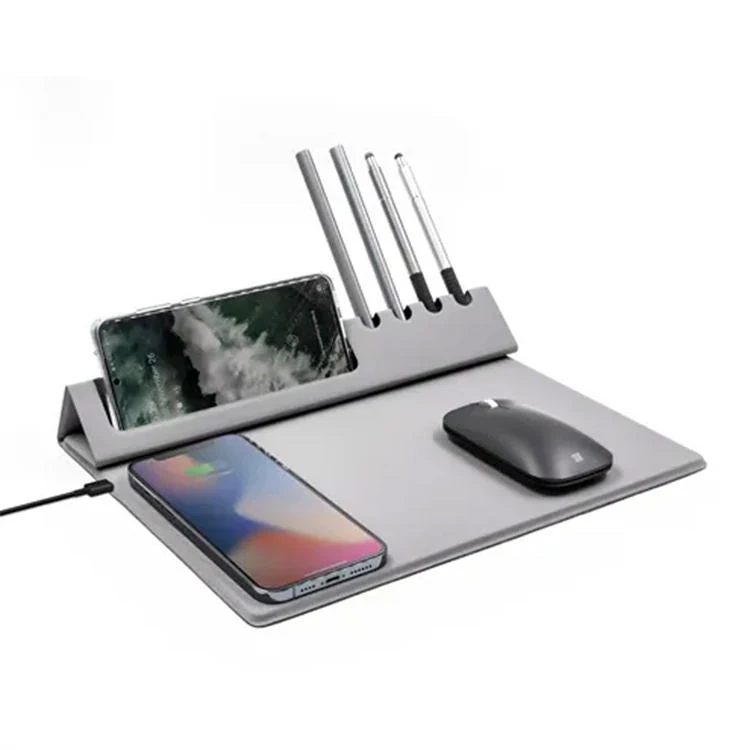 Pad in use on a desk with laptop, mouse and charging phone