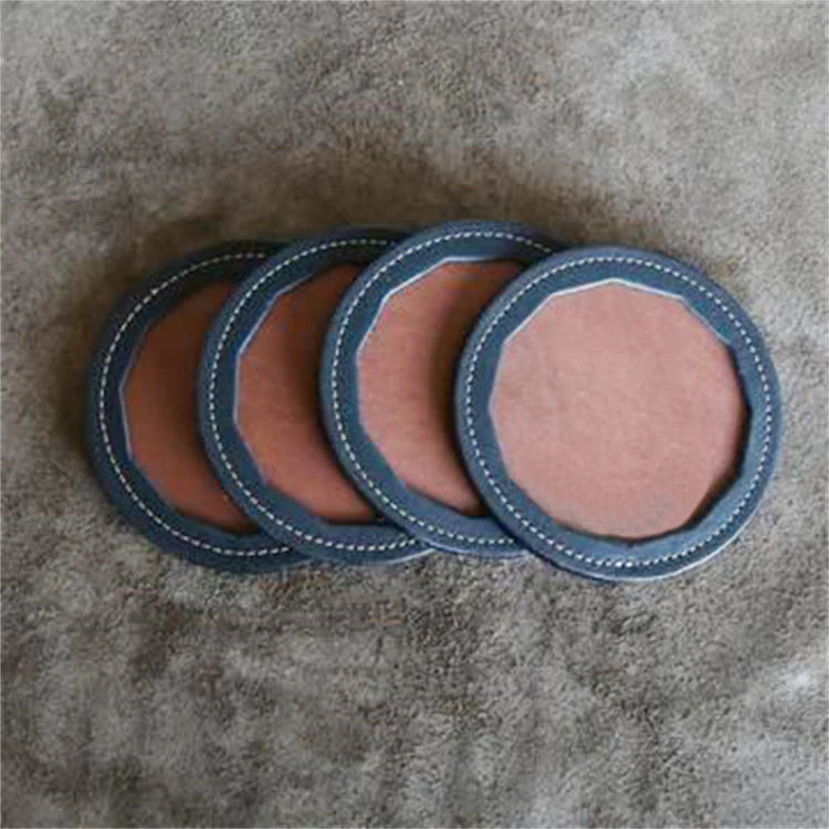 Cutout style leather coaster with a glass placed on it
