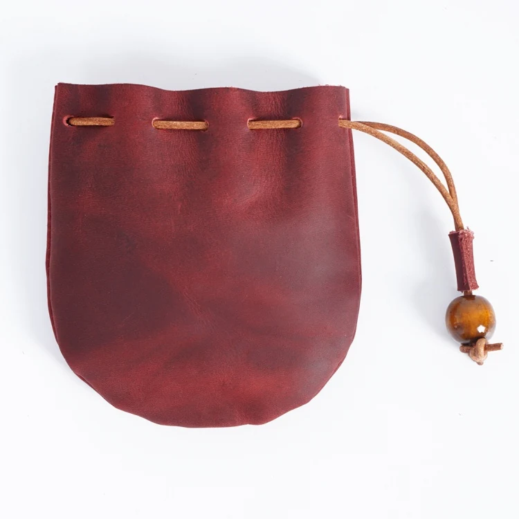 Burgundy colourway of the leather drawstring pouch