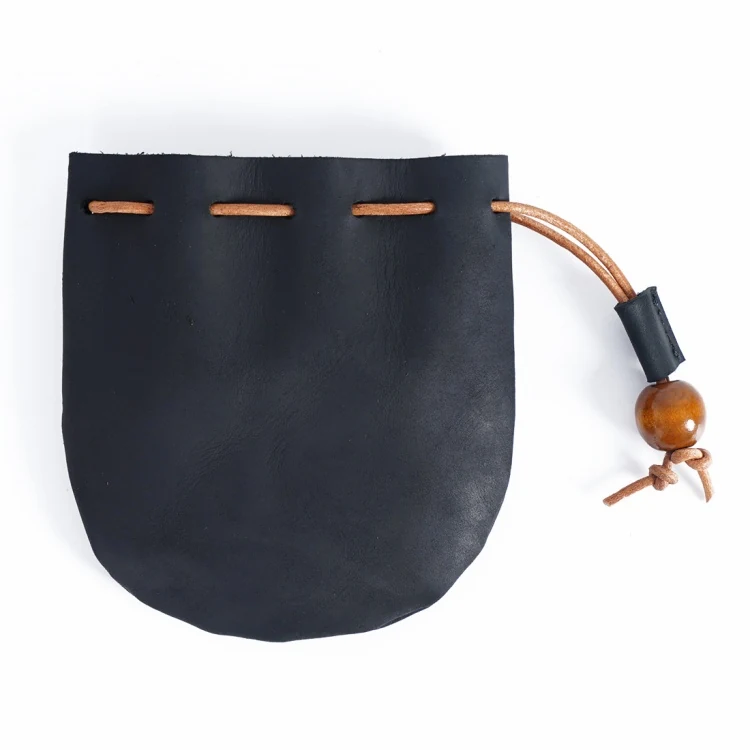 Close-up of the leather drawstring and wooden bead closure