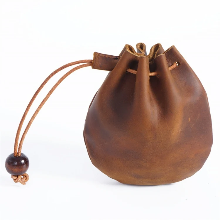 Brown full-grain leather drawstring pouch with wooden bead